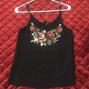 Black tank top with embroidered flowers on front